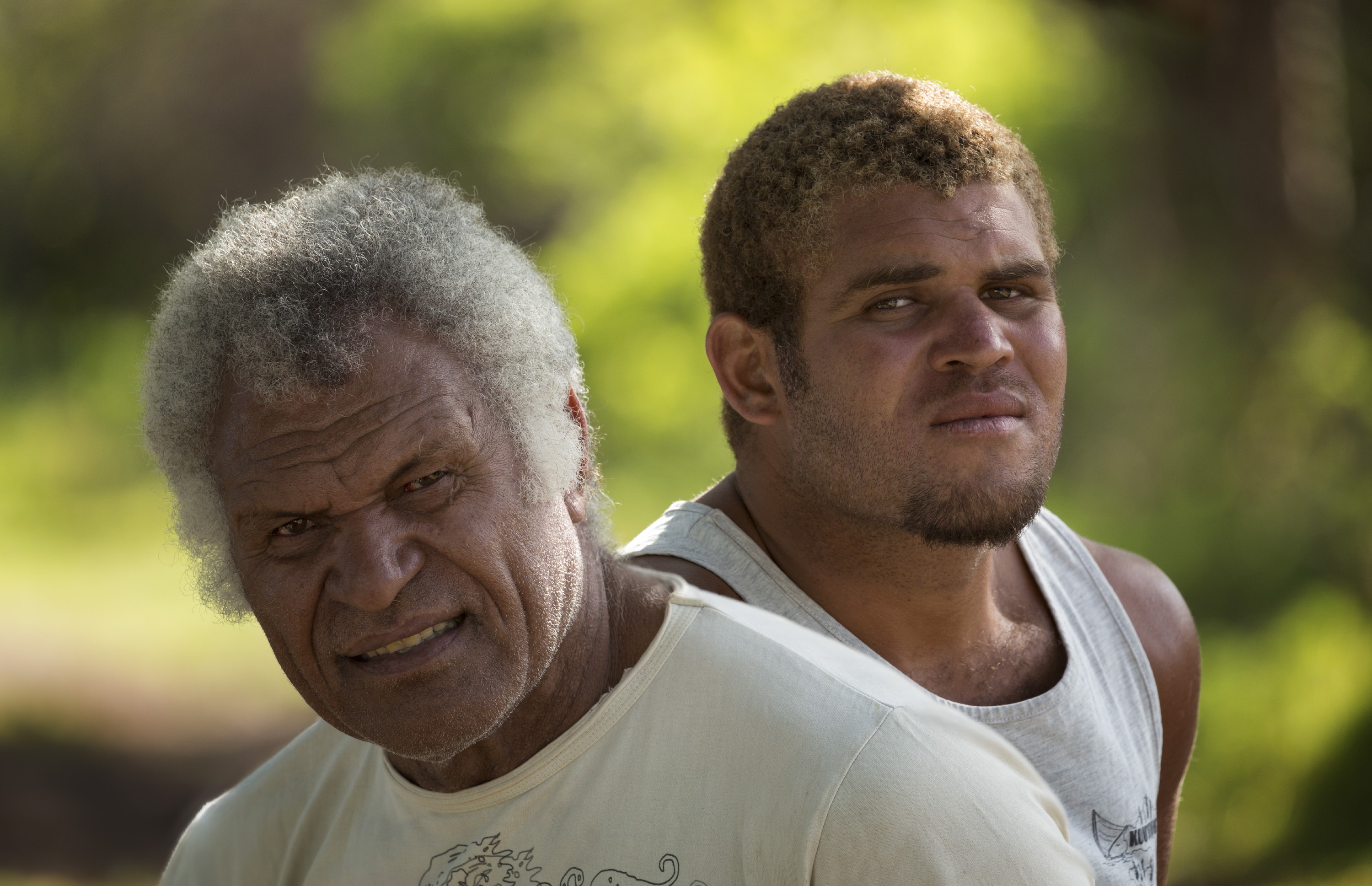 Portrait of the last paddler in New-Caledonia and his son